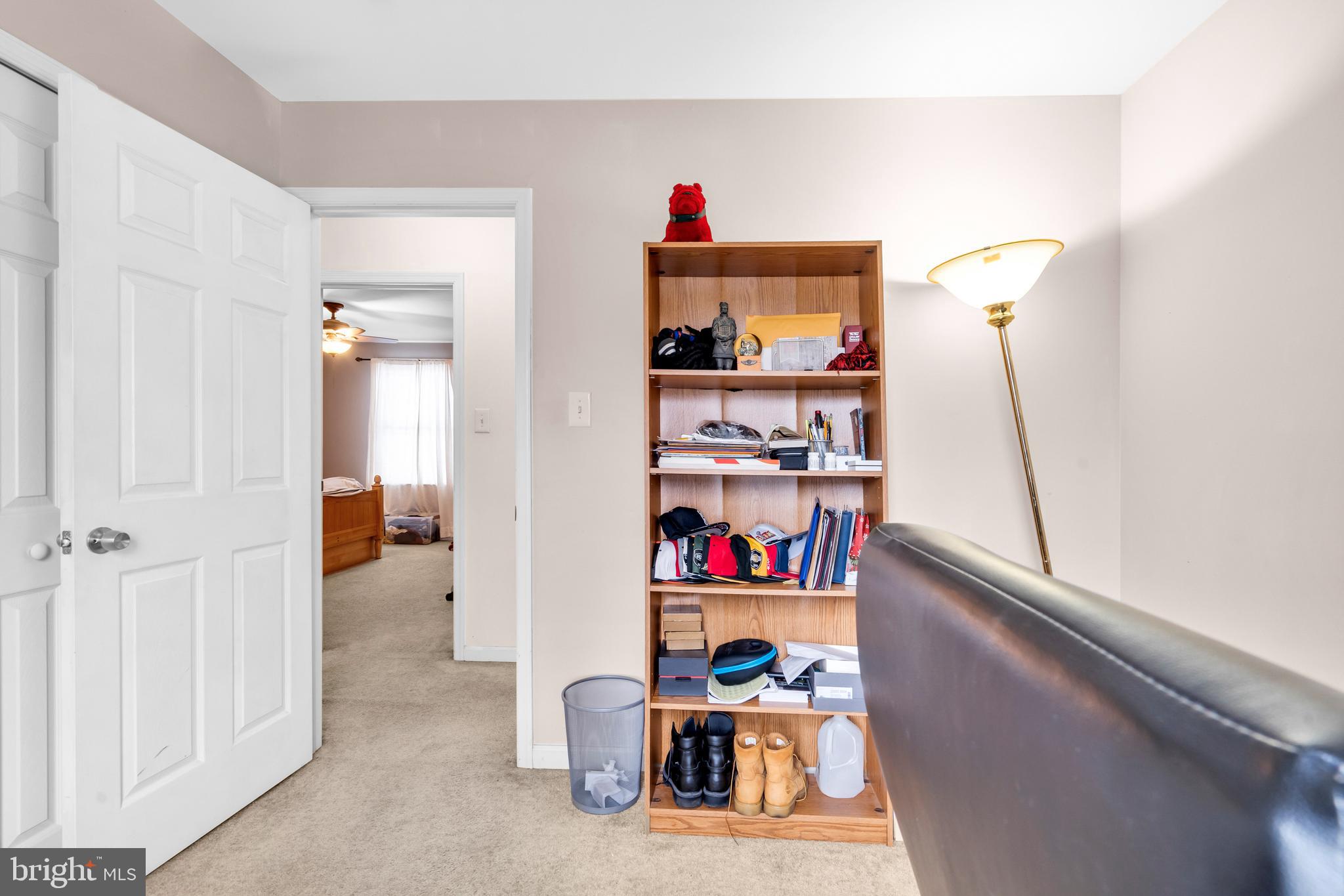 470 Wilson Avenue Lindenwold, NJ 08021 - Photo 17 of 38 a view of a hallway with a dining table and chairs