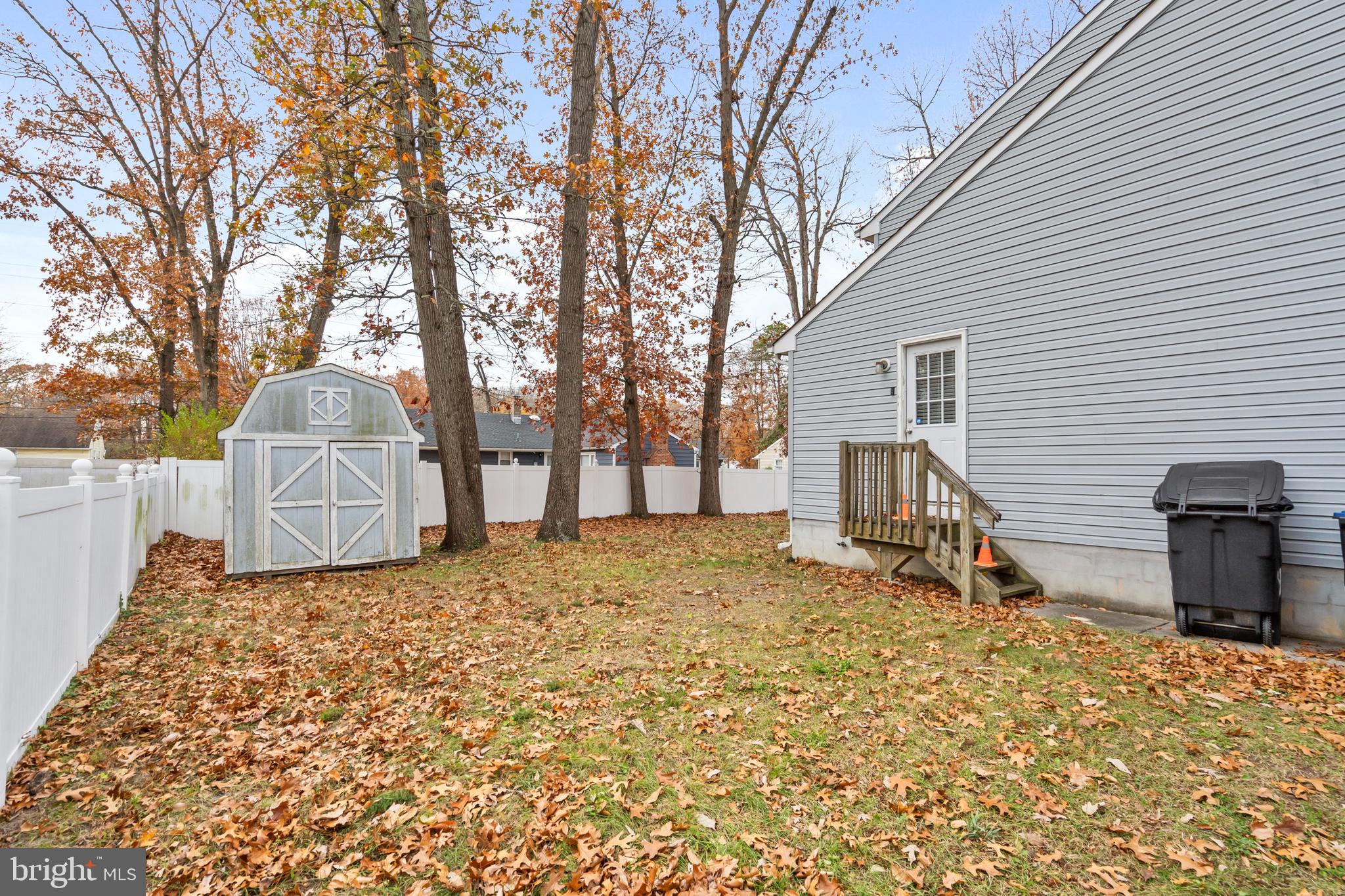 470 Wilson Avenue Lindenwold, NJ 08021 - Photo 27 of 38 a backyard of a house with oven and tree