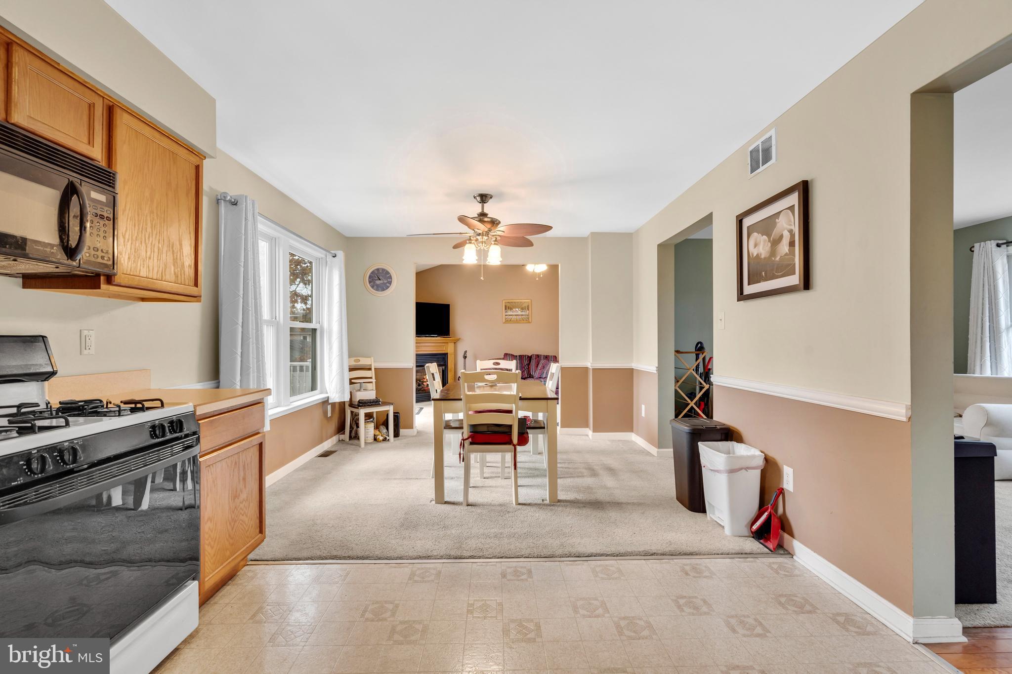 470 Wilson Avenue Lindenwold, NJ 08021 - Photo 5 of 38 a living room with furniture and a flat screen tv