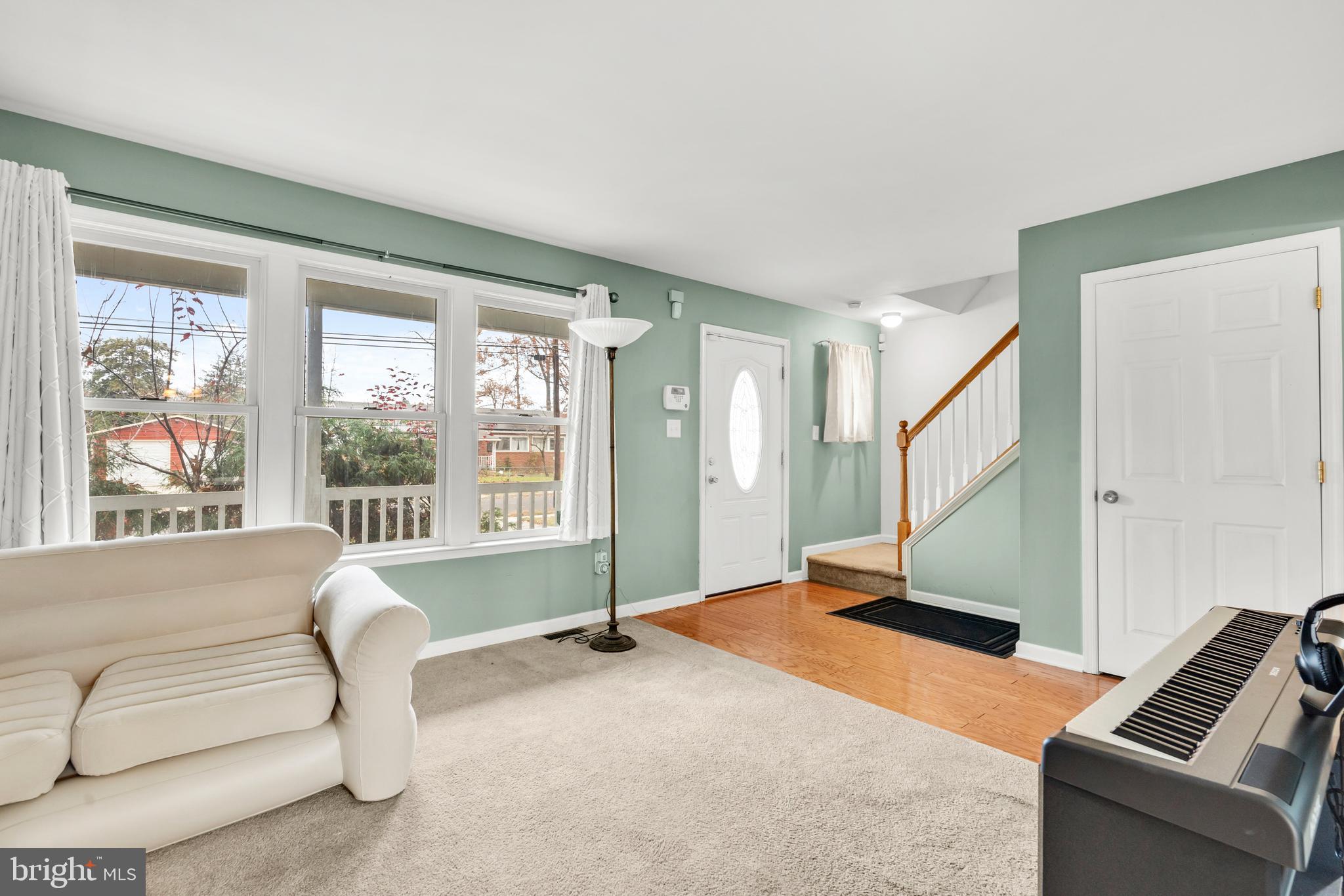 470 Wilson Avenue Lindenwold, NJ 08021 - Photo 10 of 38 a living room with furniture and a large window