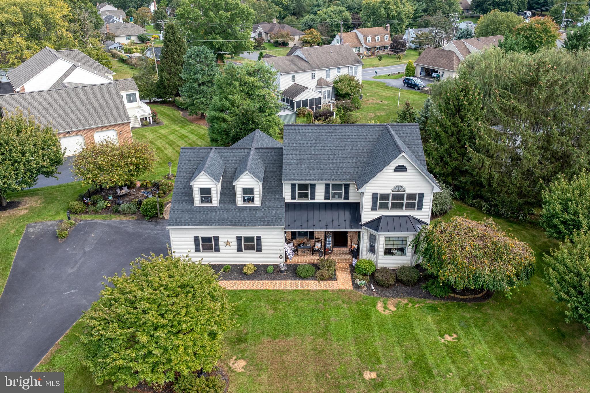 5 Village Drive Lititz, PA 17543 - Photo 57 of 62 a aerial view of a house with a yard table and chairs