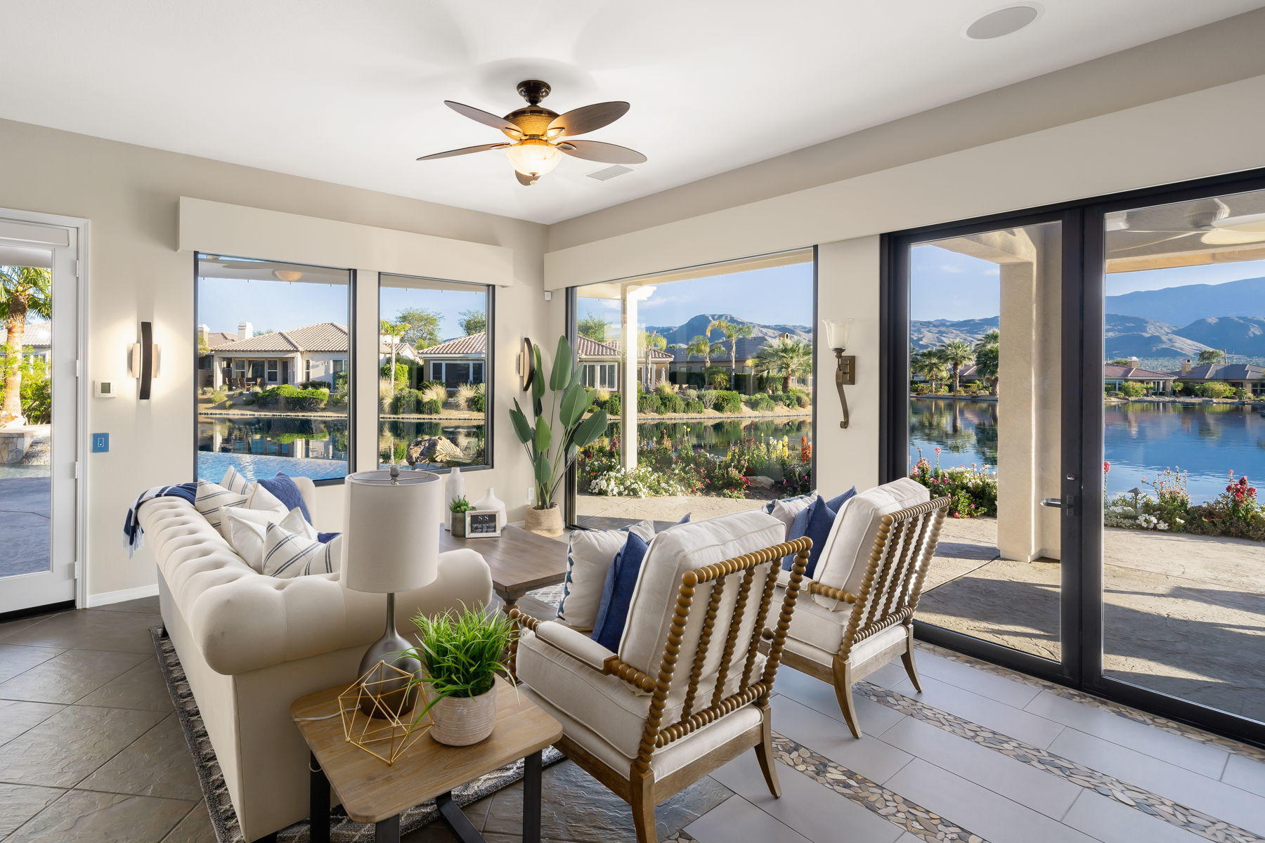 3 Pyramid Lake Court Rancho Mirage, CA 92270 - Photo 13 of 40 a living room with furniture and a large window