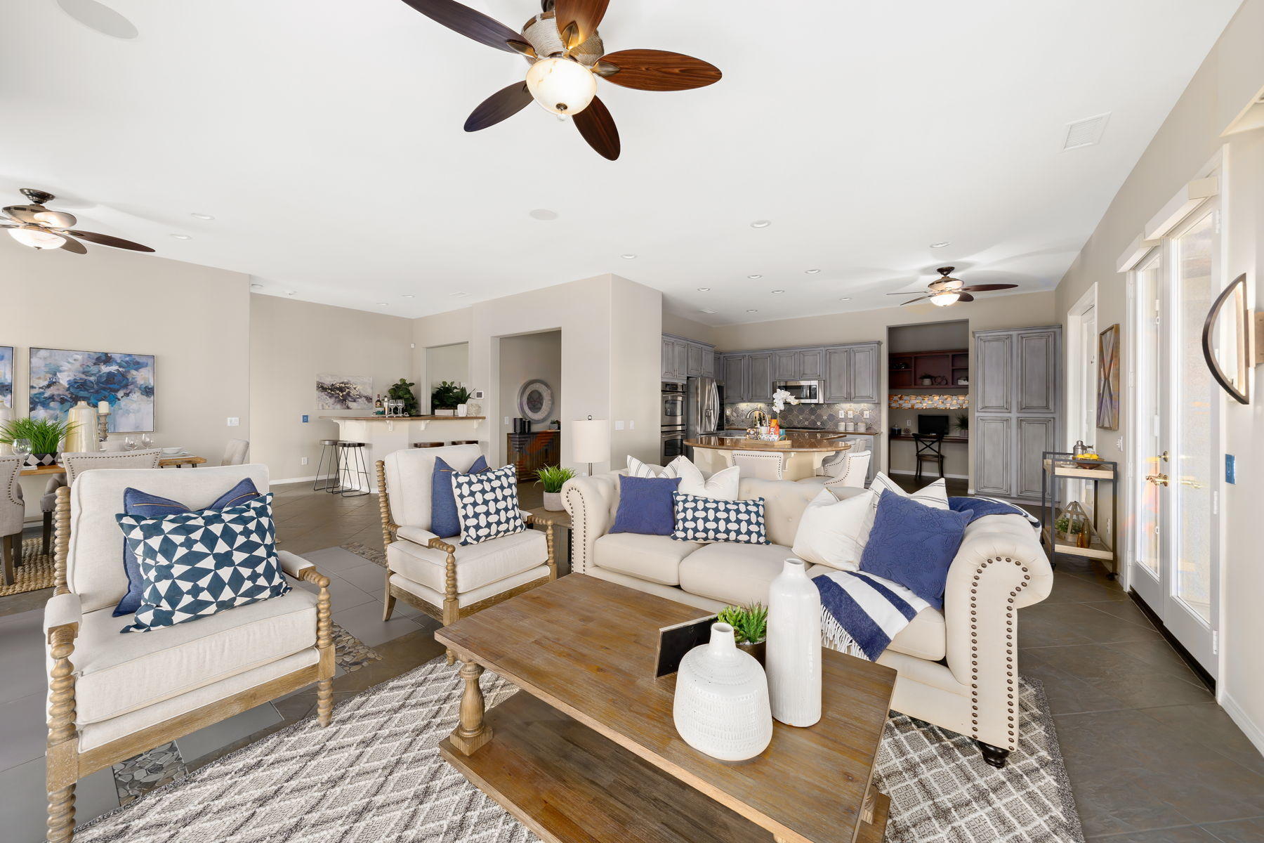 3 Pyramid Lake Court Rancho Mirage, CA 92270 - Photo 14 of 40 a living room with furniture kitchen view and a chandelier