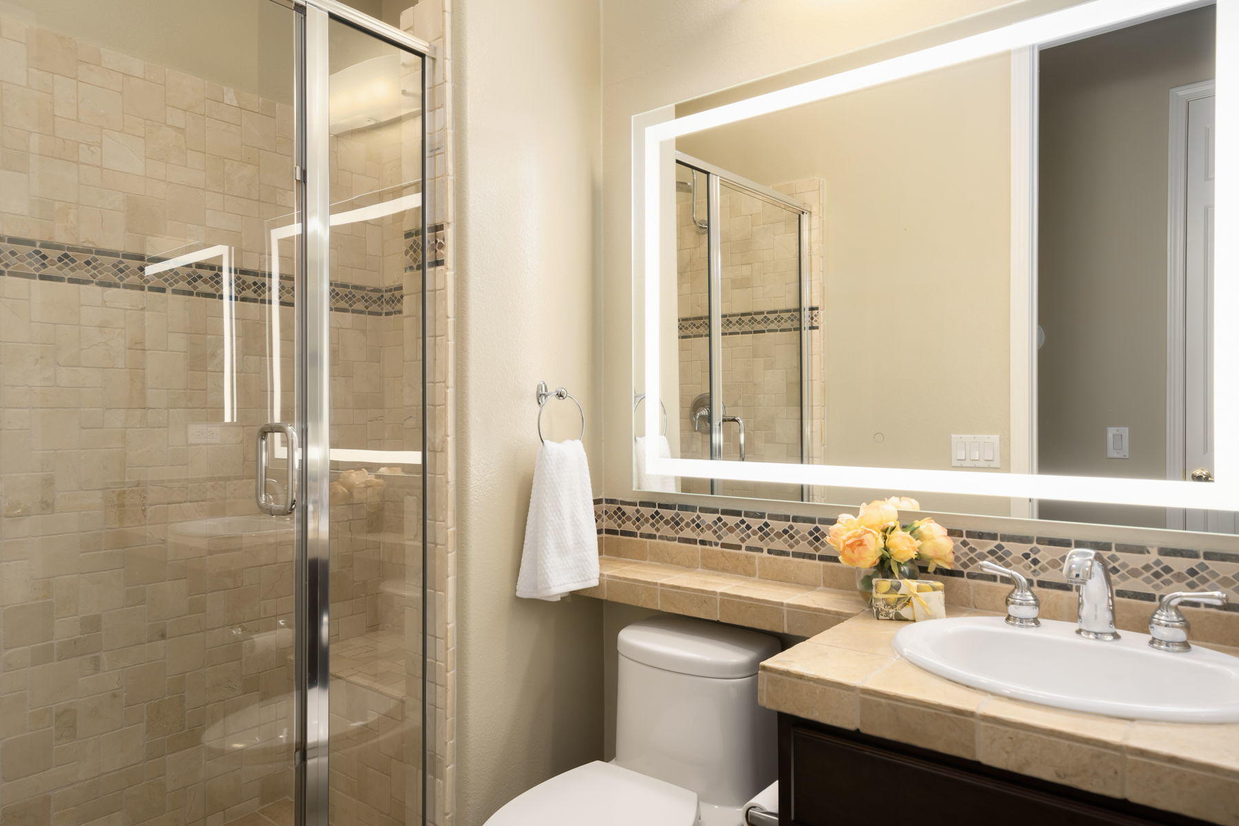 3 Pyramid Lake Court Rancho Mirage, CA 92270 - Photo 25 of 40 a bathroom with a sink toilet and shower