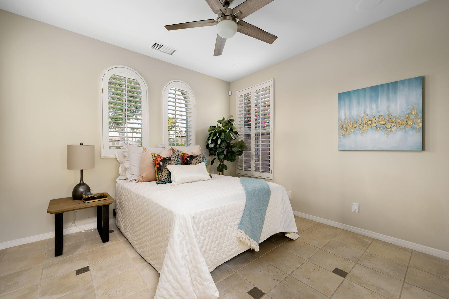 3 Pyramid Lake Court Rancho Mirage, CA 92270 - Photo 30 of 40 a bedroom with a bed and window
