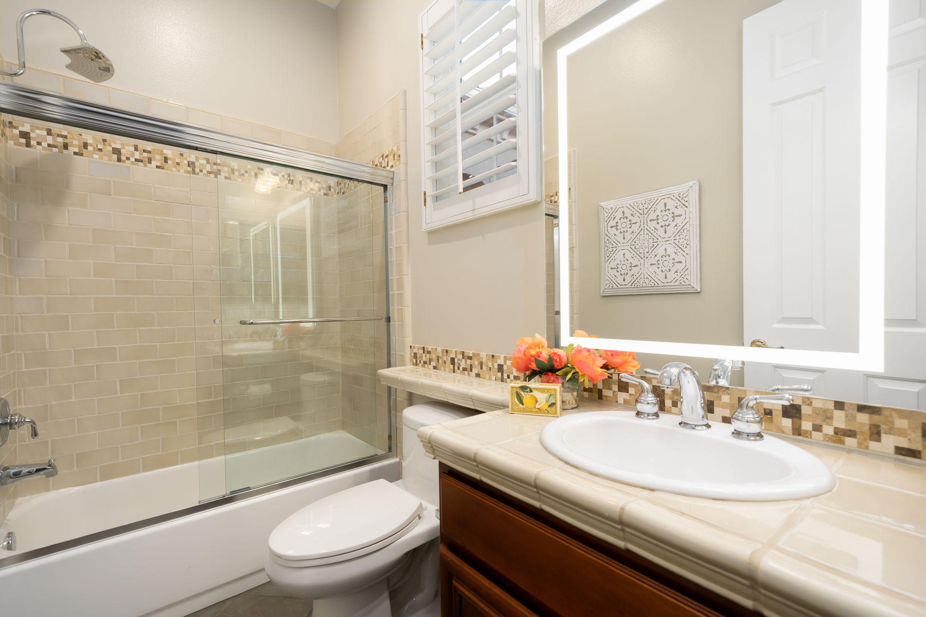 3 Pyramid Lake Court Rancho Mirage, CA 92270 - Photo 31 of 40 a bathroom with a sink a toilet and shower