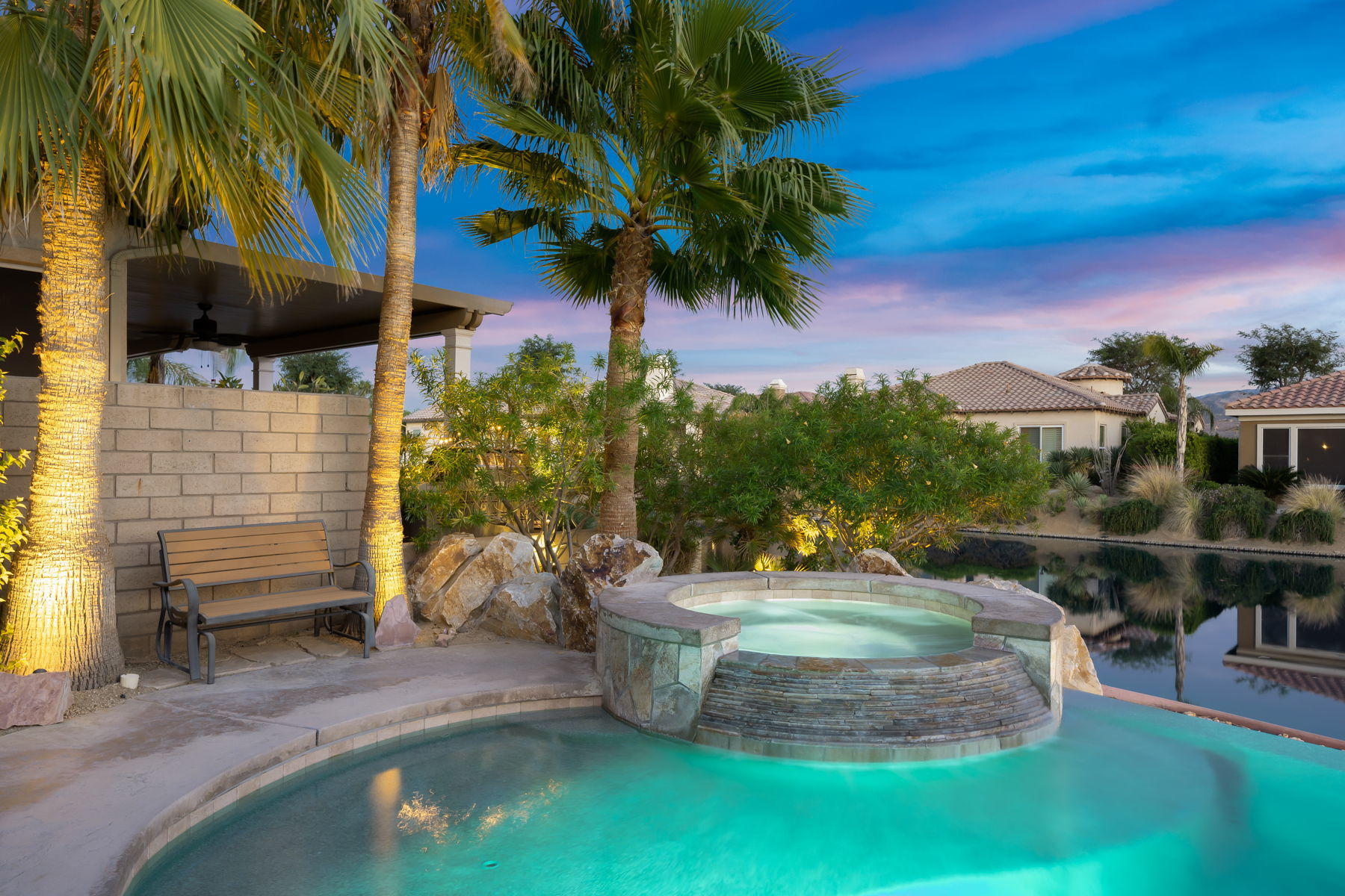 3 Pyramid Lake Court Rancho Mirage, CA 92270 - Photo 36 of 40 a view of a backyard with plants and a patio