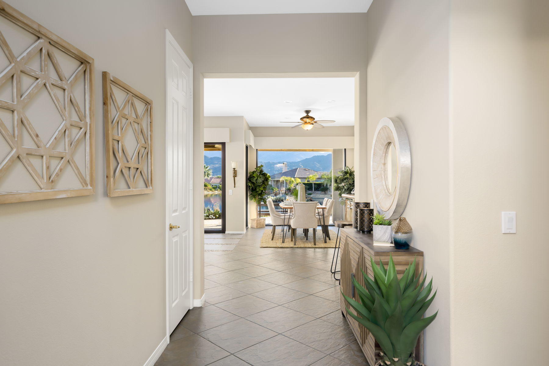 3 Pyramid Lake Court Rancho Mirage, CA 92270 - Photo 8 of 40 a living room with furniture and a large window