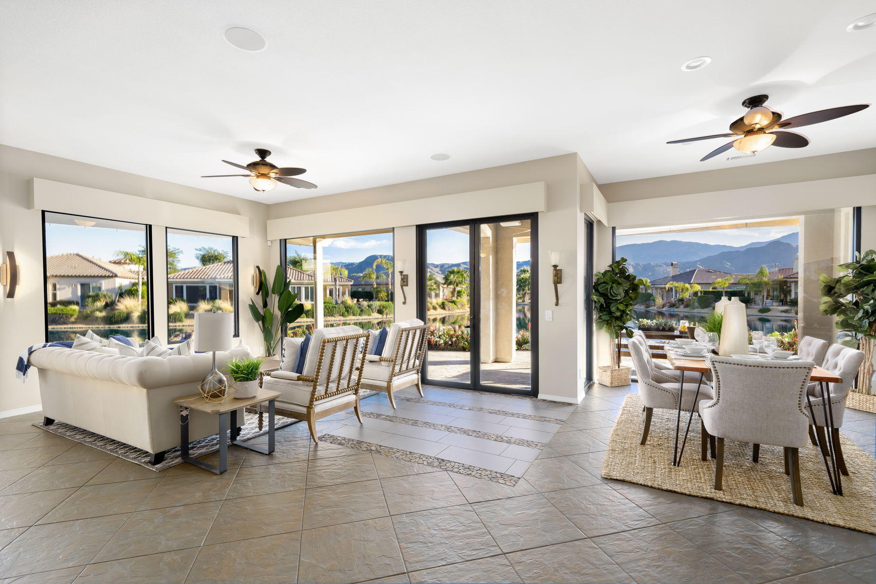 3 Pyramid Lake Court Rancho Mirage, CA 92270 - Photo 9 of 40 a living room with furniture and a large window