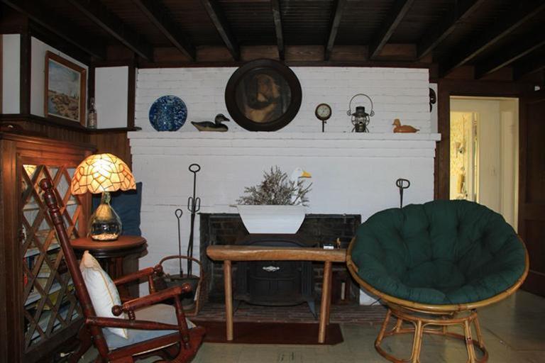 4 Franz Road Orleans, MA 02653 - Photo 11 of 30 a view of a dining room with furniture and wooden floor