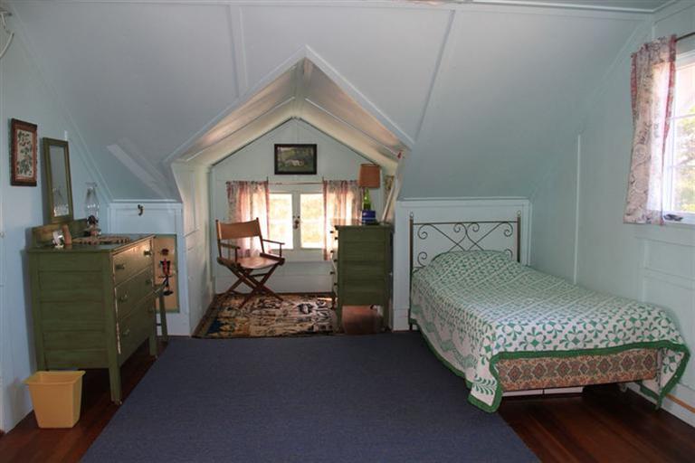 4 Franz Road Orleans, MA 02653 - Photo 18 of 30 a bedroom with a bed and a window