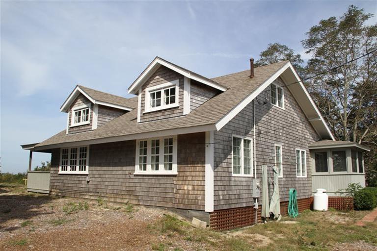 4 Franz Road Orleans, MA 02653 - Photo 2 of 30 a front view of a house with a yard