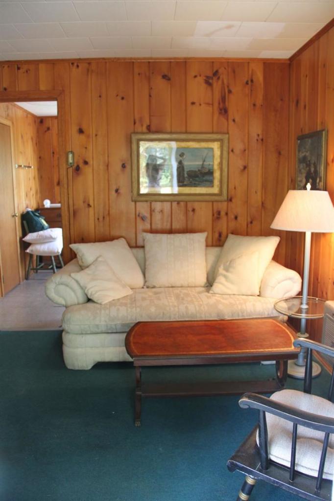 4 Franz Road Orleans, MA 02653 - Photo 25 of 30 a bedroom with bed and window