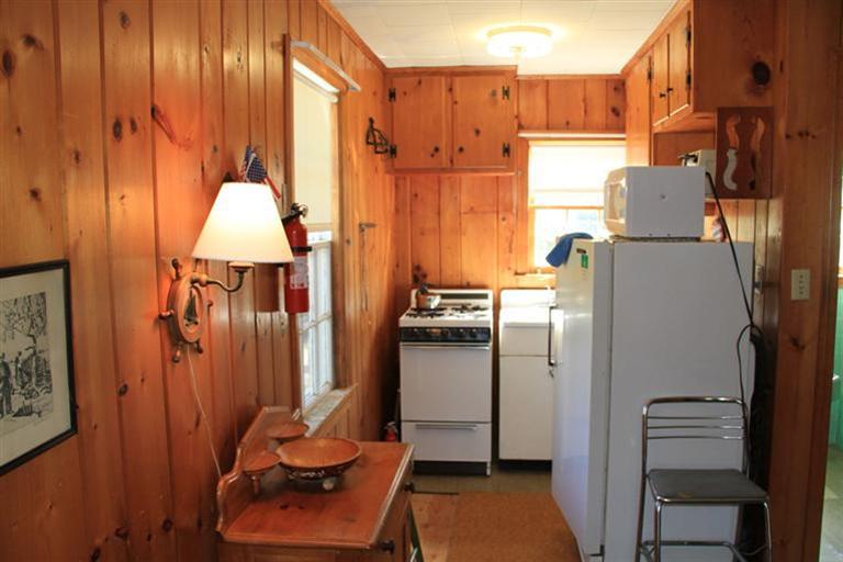 4 Franz Road Orleans, MA 02653 - Photo 27 of 30 a room with refrigerator and washer
