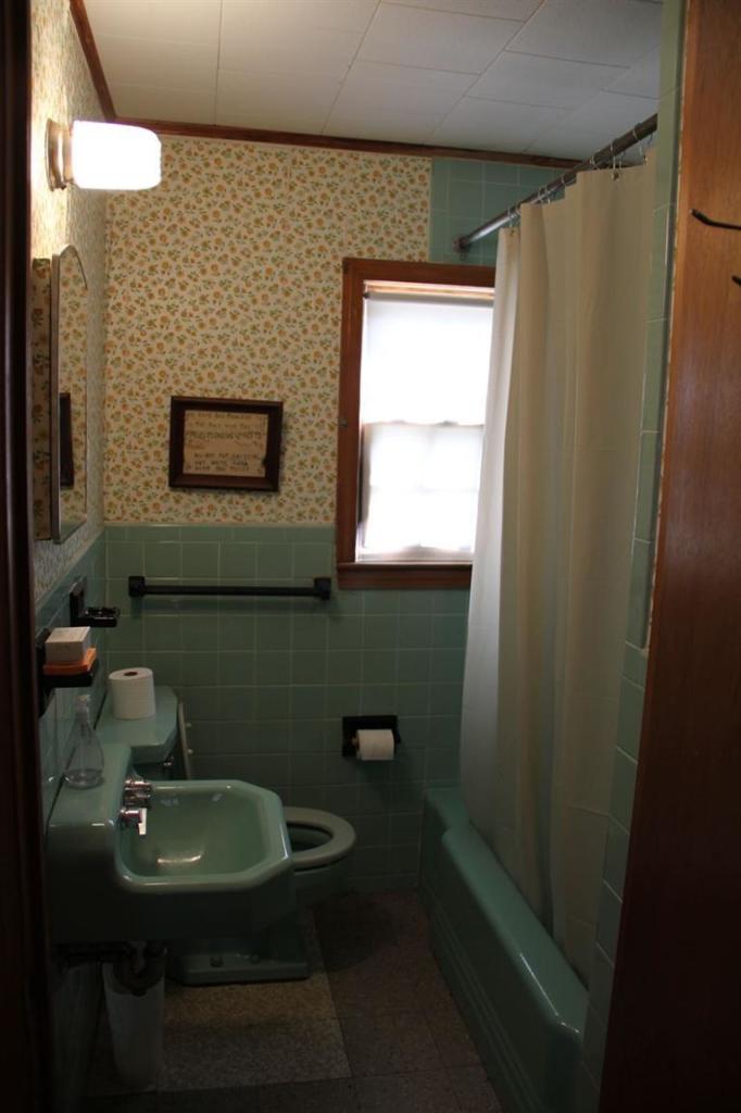 4 Franz Road Orleans, MA 02653 - Photo 28 of 30 a bathroom with a sink a toilet and mirror