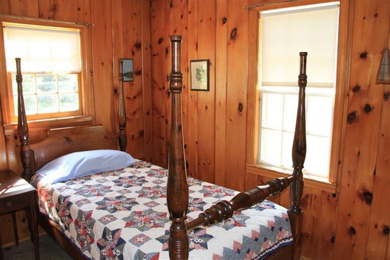 4 Franz Road Orleans, MA 02653 - Photo 30 of 30 a bedroom with a bed and a window