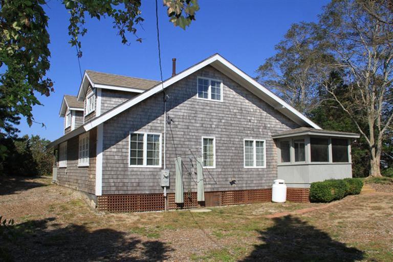 4 Franz Road Orleans, MA 02653 - Photo 3 of 30 a front view of a house with a yard