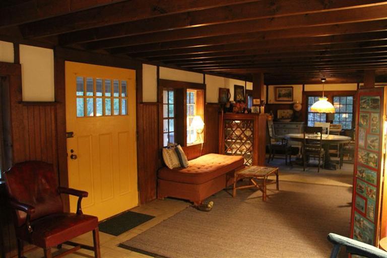 4 Franz Road Orleans, MA 02653 - Photo 8 of 30 a living room with furniture a flat screen tv and outdoor seating