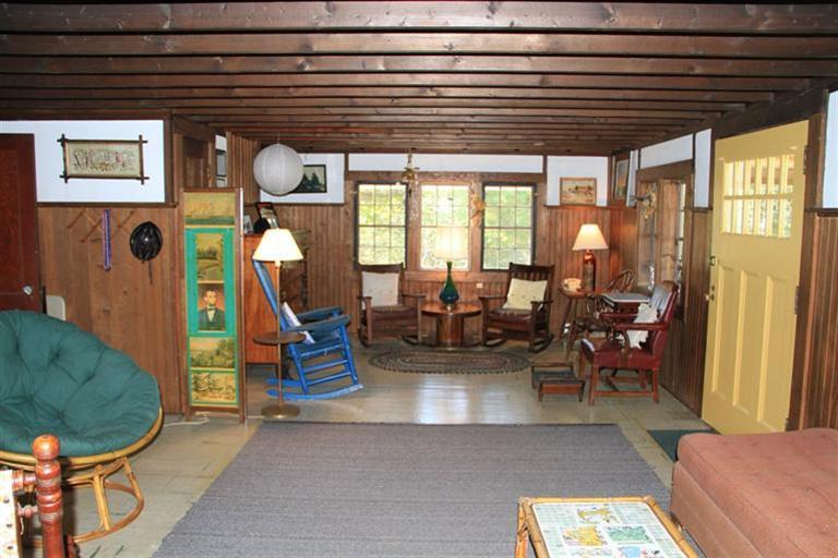 4 Franz Road Orleans, MA 02653 - Photo 9 of 30 a living room with furniture a rug and a large window