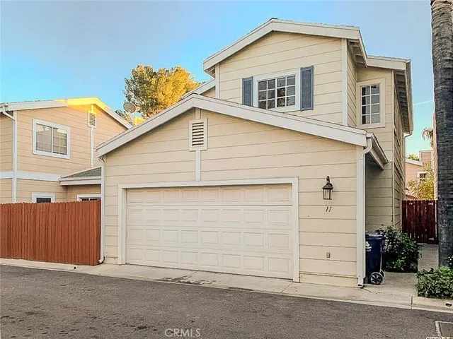 a view of a house with a garage