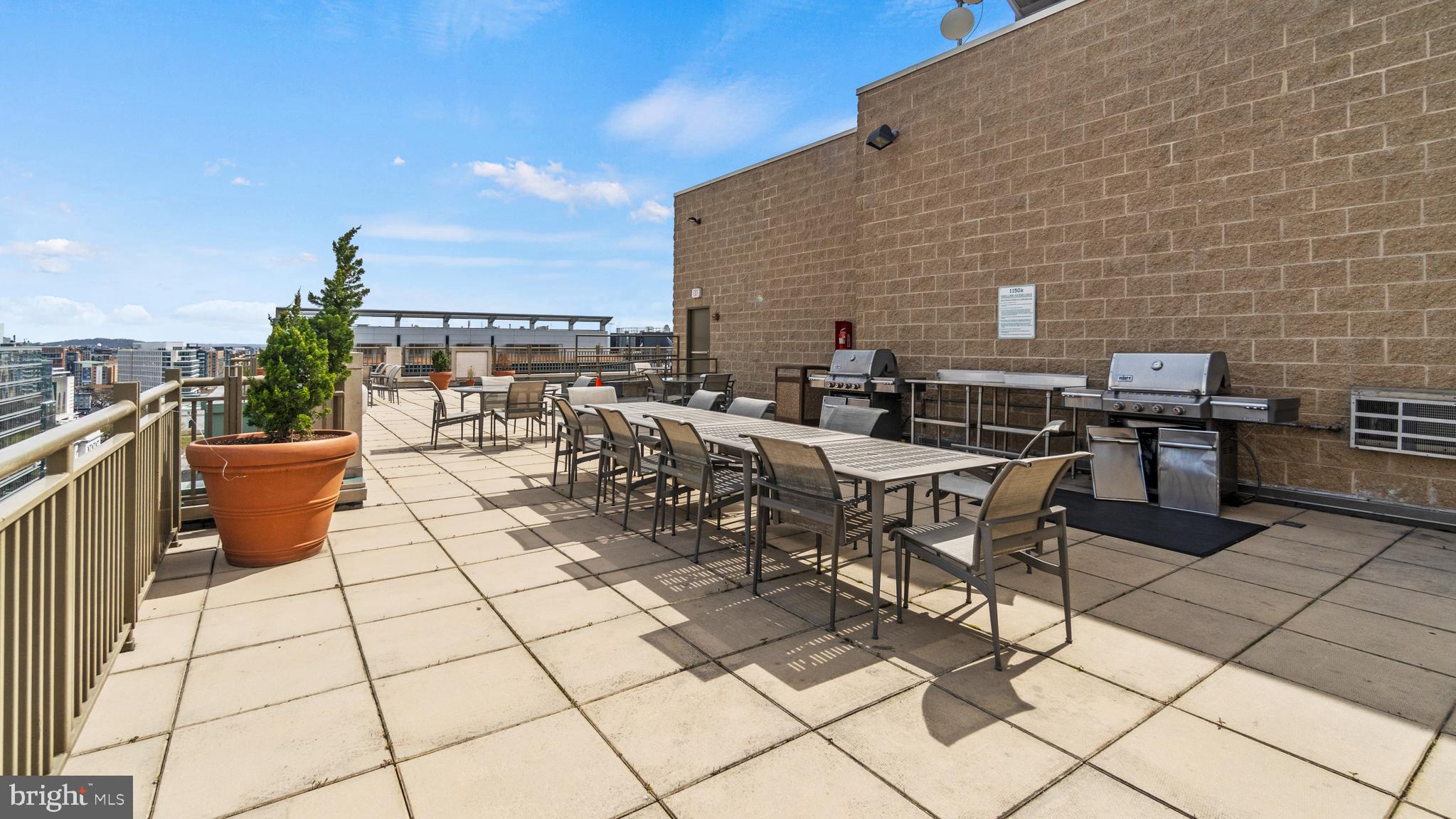 1150 K Street Northwest, Unit 1107 Washington, DC 20005 - Photo 14 of 20 a view of a terrace with furniture