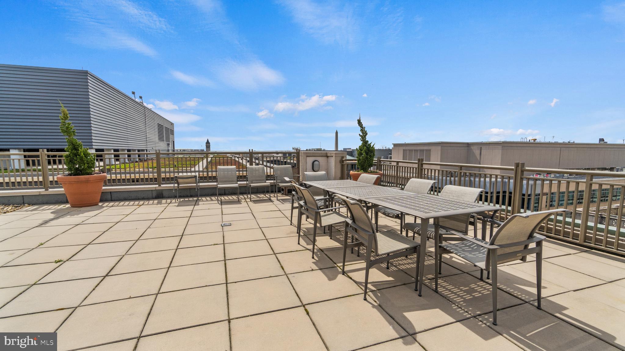 1150 K Street Northwest, Unit 1107 Washington, DC 20005 - Photo 15 of 20 a view of a terrace with furniture