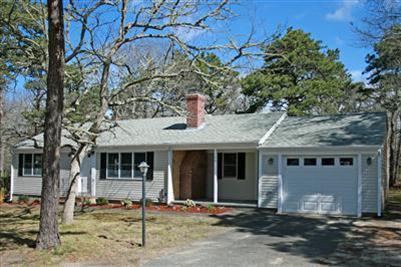 126 Long Road Harwich, MA 02645 - Photo 8 of 8 a front view of a house with a garden