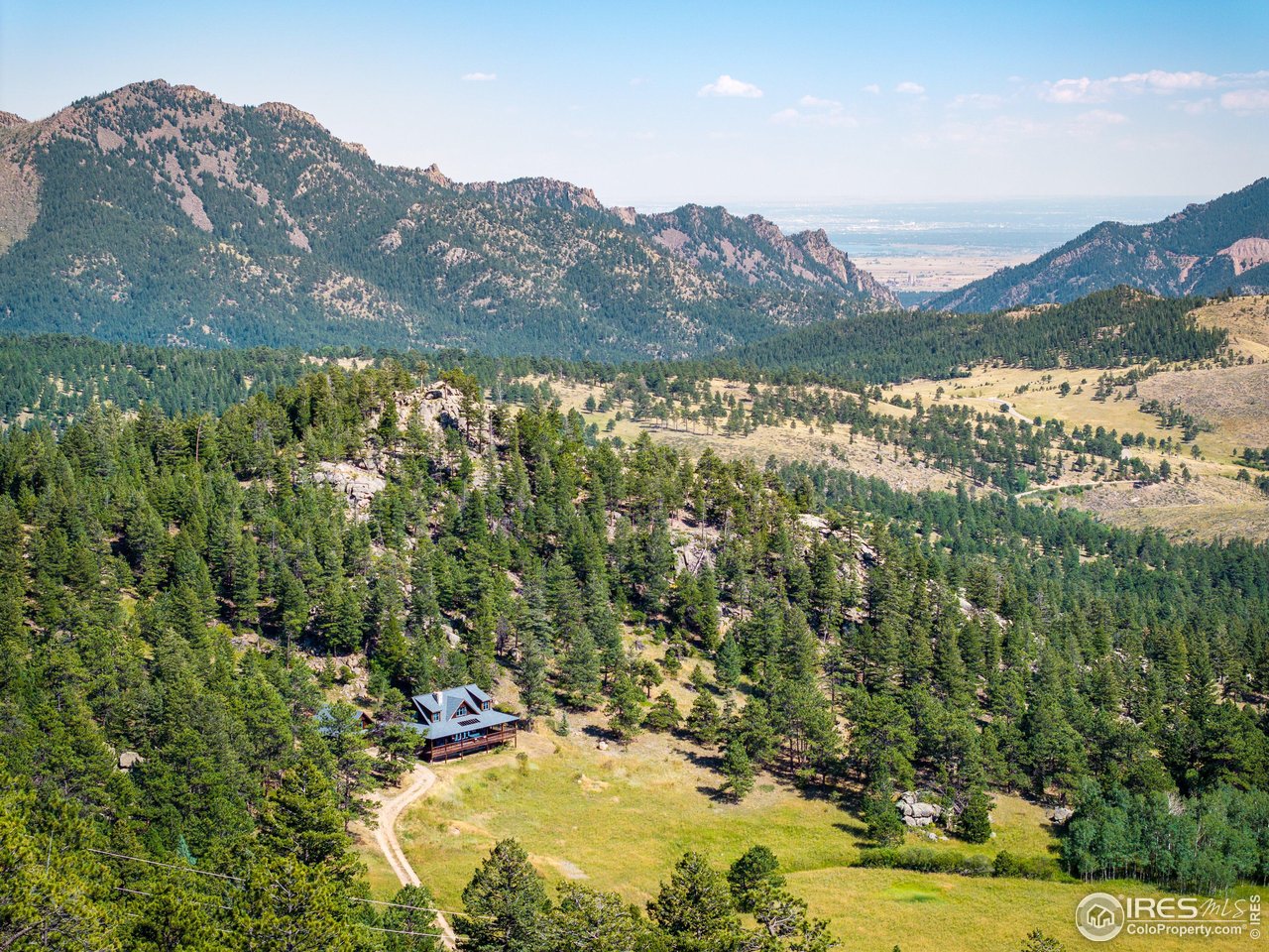 8558 Flagstaff Road Boulder, CO 80302 - Photo 1 of 50 a view of lake with mountain