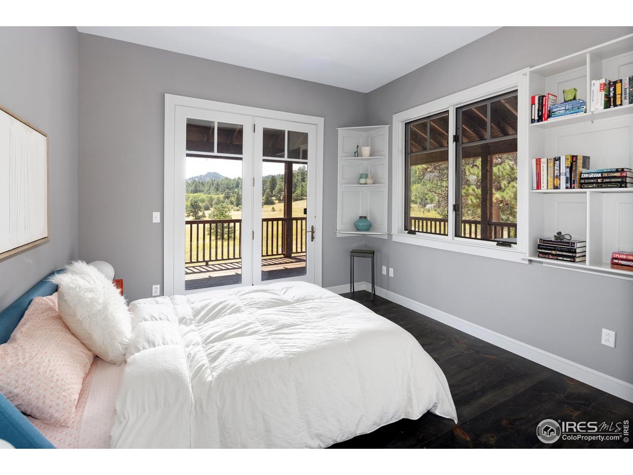 8558 Flagstaff Road Boulder, CO 80302 - Photo 11 of 50 a bedroom with a bed and a window