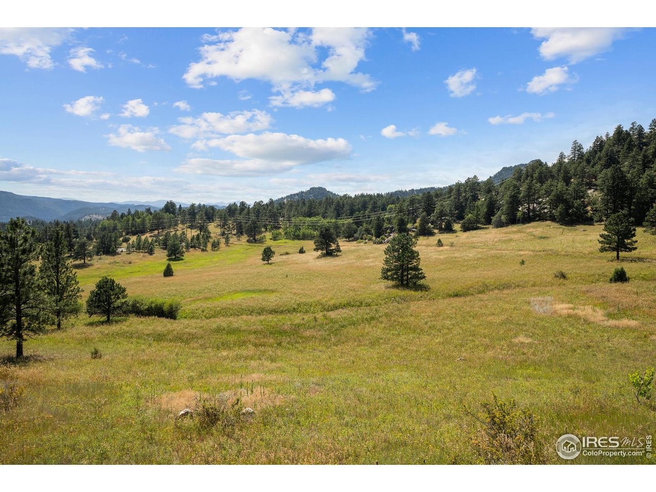 8558 Flagstaff Road Boulder, CO 80302 - Photo 15 of 50 a view of an ocean of beach and mountain