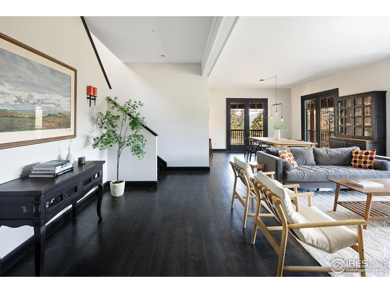 8558 Flagstaff Road Boulder, CO 80302 - Photo 16 of 50 a living room with furniture and a potted plant