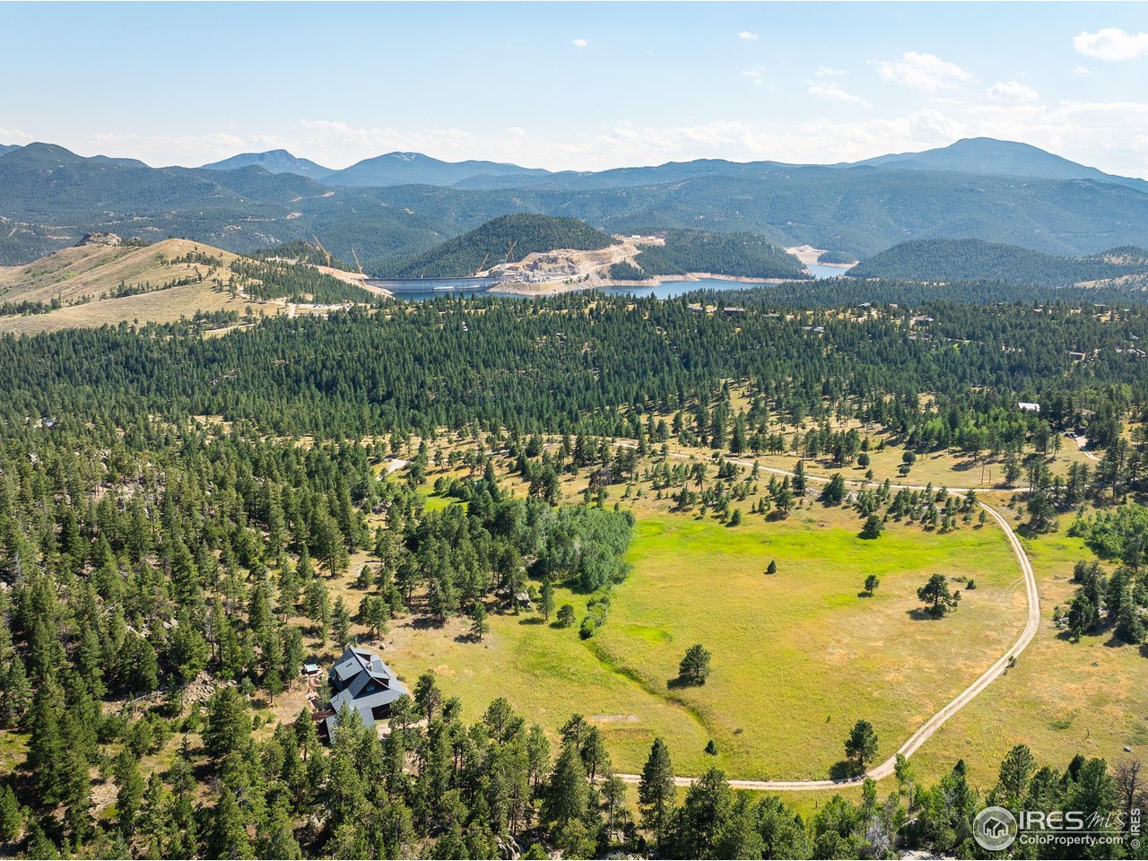 8558 Flagstaff Road Boulder, CO 80302 - Photo 2 of 50 a view of a city with mountains in the background