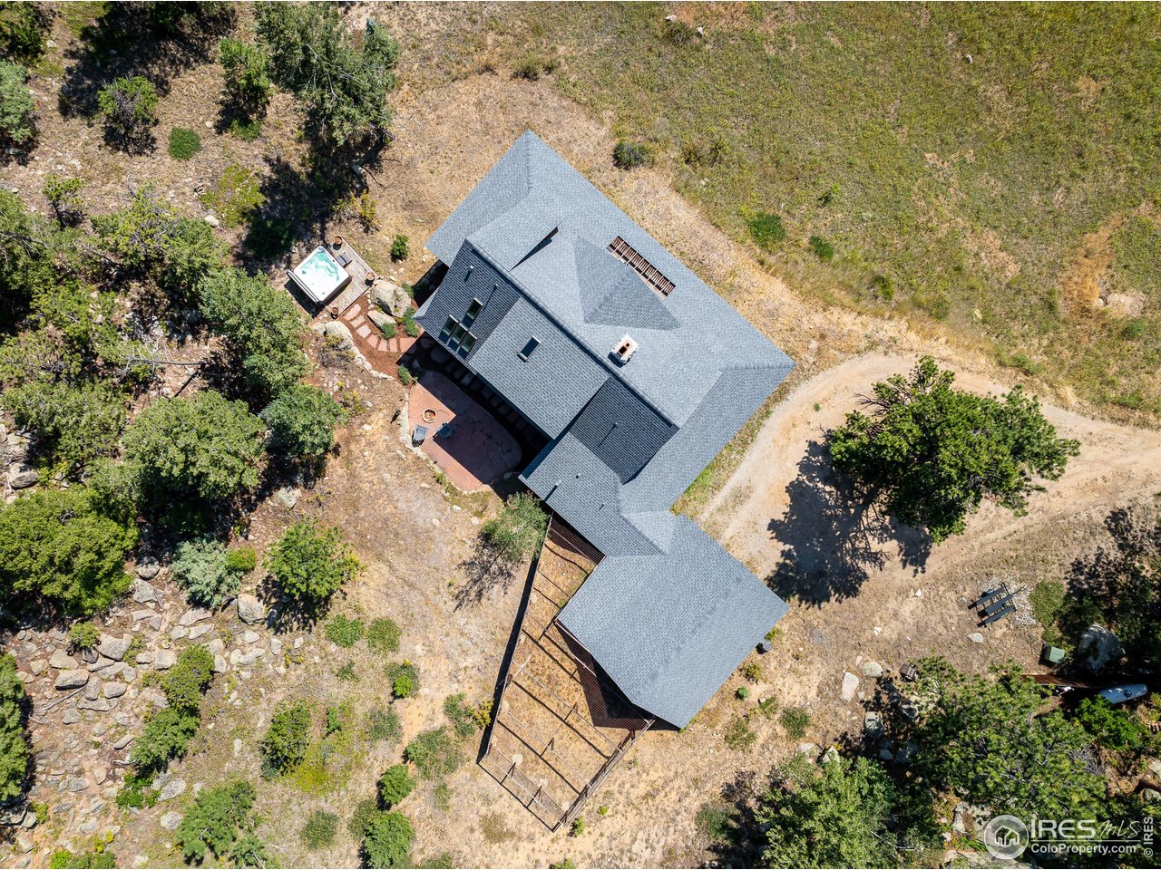 8558 Flagstaff Road Boulder, CO 80302 - Photo 46 of 50 an aerial view of a house with a yard