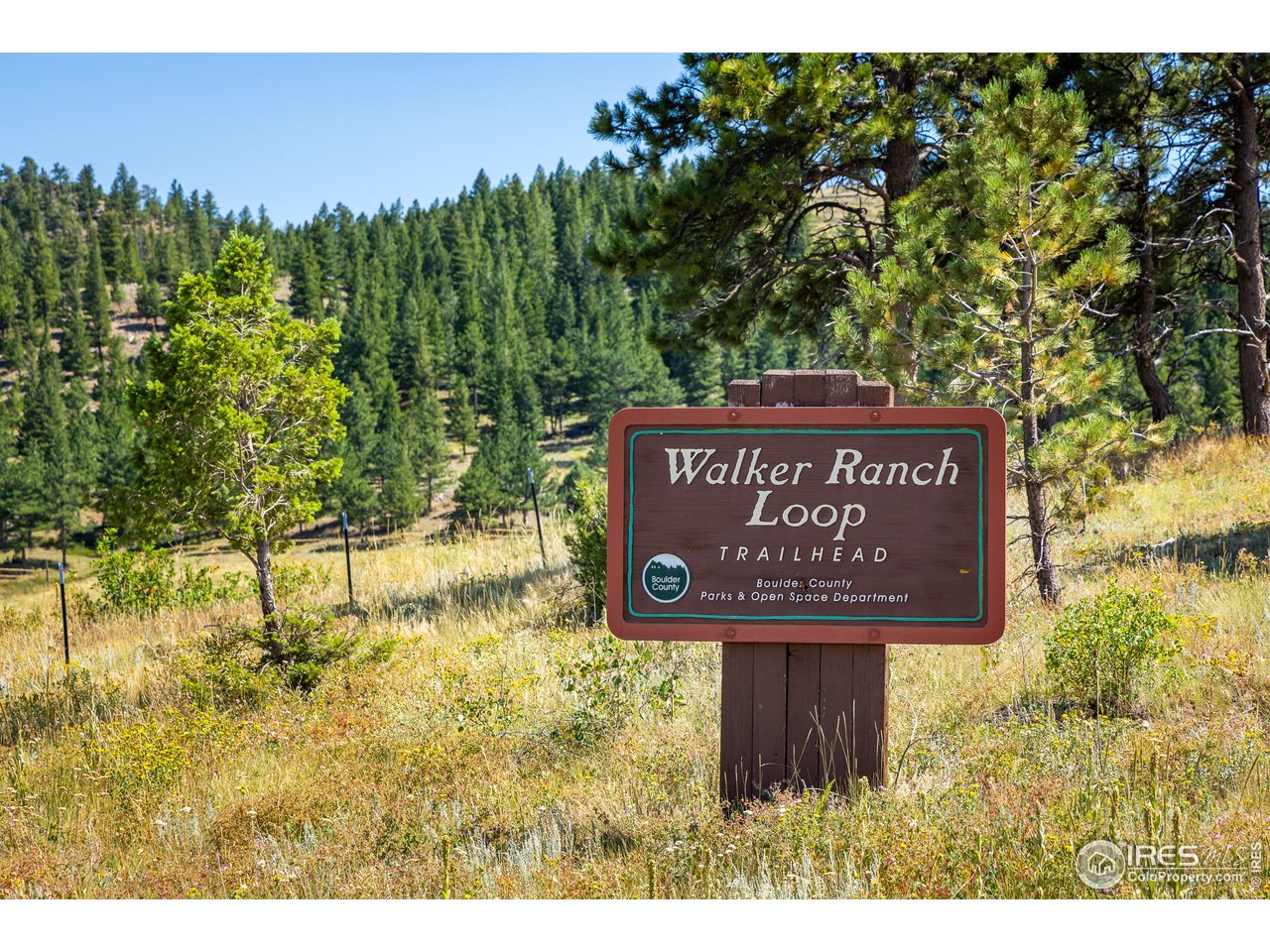 8558 Flagstaff Road Boulder, CO 80302 - Photo 48 of 50 a sign that is sitting on a brick wall