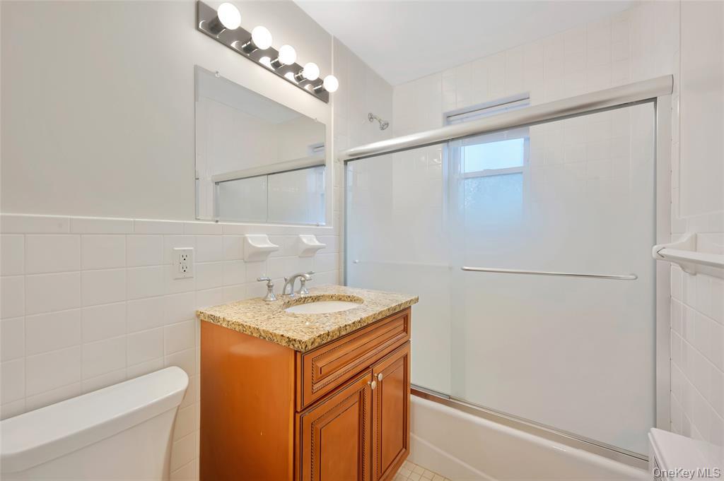 504 Pelham Road New Rochelle, NY 10805 - Photo 18 of 26 a utility room with dryer and washer