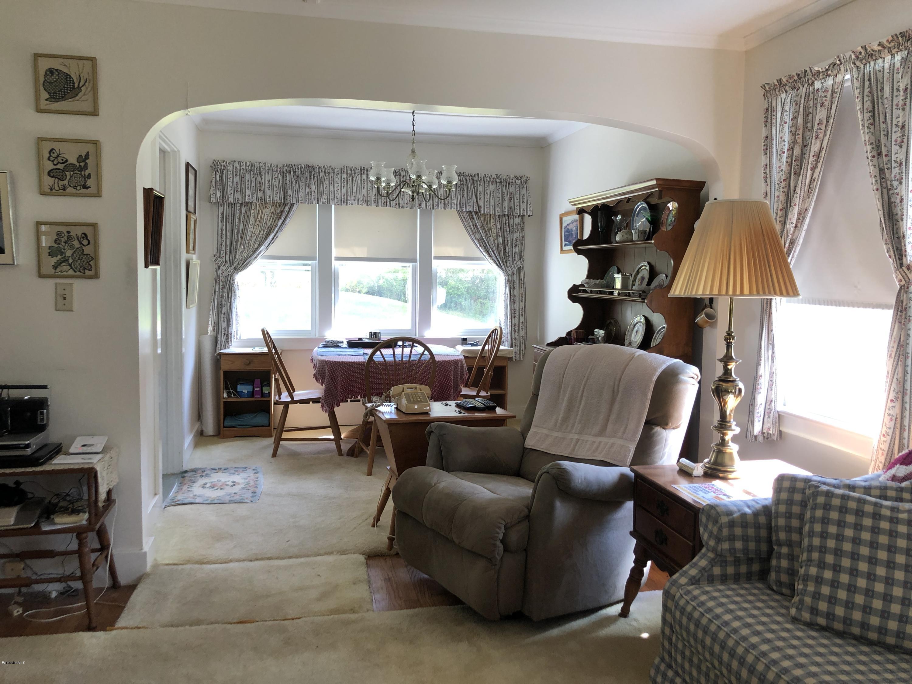 100 Henderson Road Clarksburg, MA 01247 - Photo 4 of 11 living room & dining room
