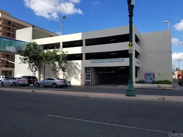a view of a building with a street