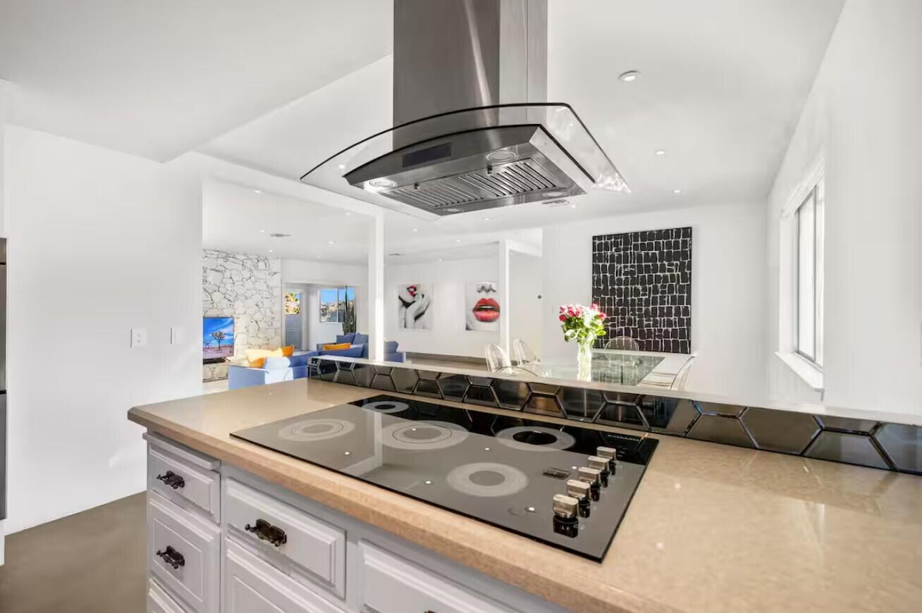 6451 Red Bluff Avenue Yucca Valley, CA 92284 - Photo 20 of 71 a kitchen with stainless steel appliances granite countertop a sink stove and cabinets