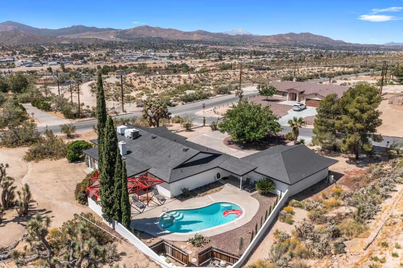 6451 Red Bluff Avenue Yucca Valley, CA 92284 - Photo 2 of 71 an aerial view of residential houses with outdoor space