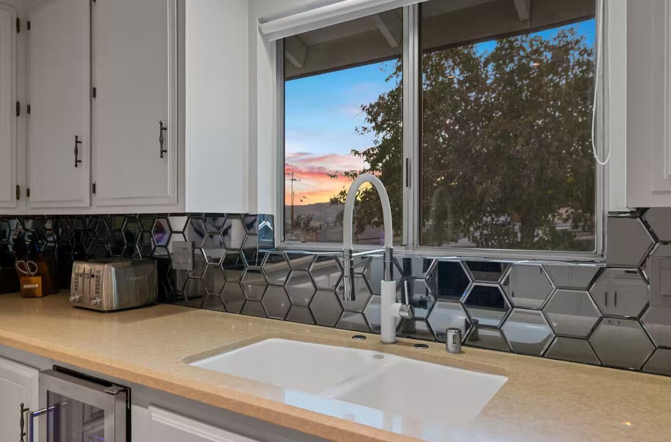 6451 Red Bluff Avenue Yucca Valley, CA 92284 - Photo 23 of 71 a kitchen with a sink and a view of living room