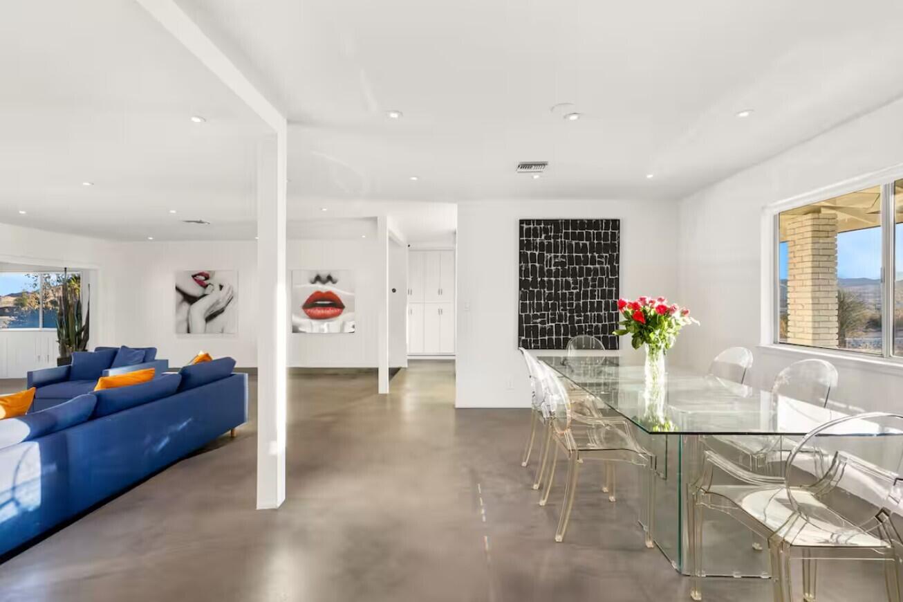 6451 Red Bluff Avenue Yucca Valley, CA 92284 - Photo 24 of 71 a living room with furniture flowers flowers and table in it