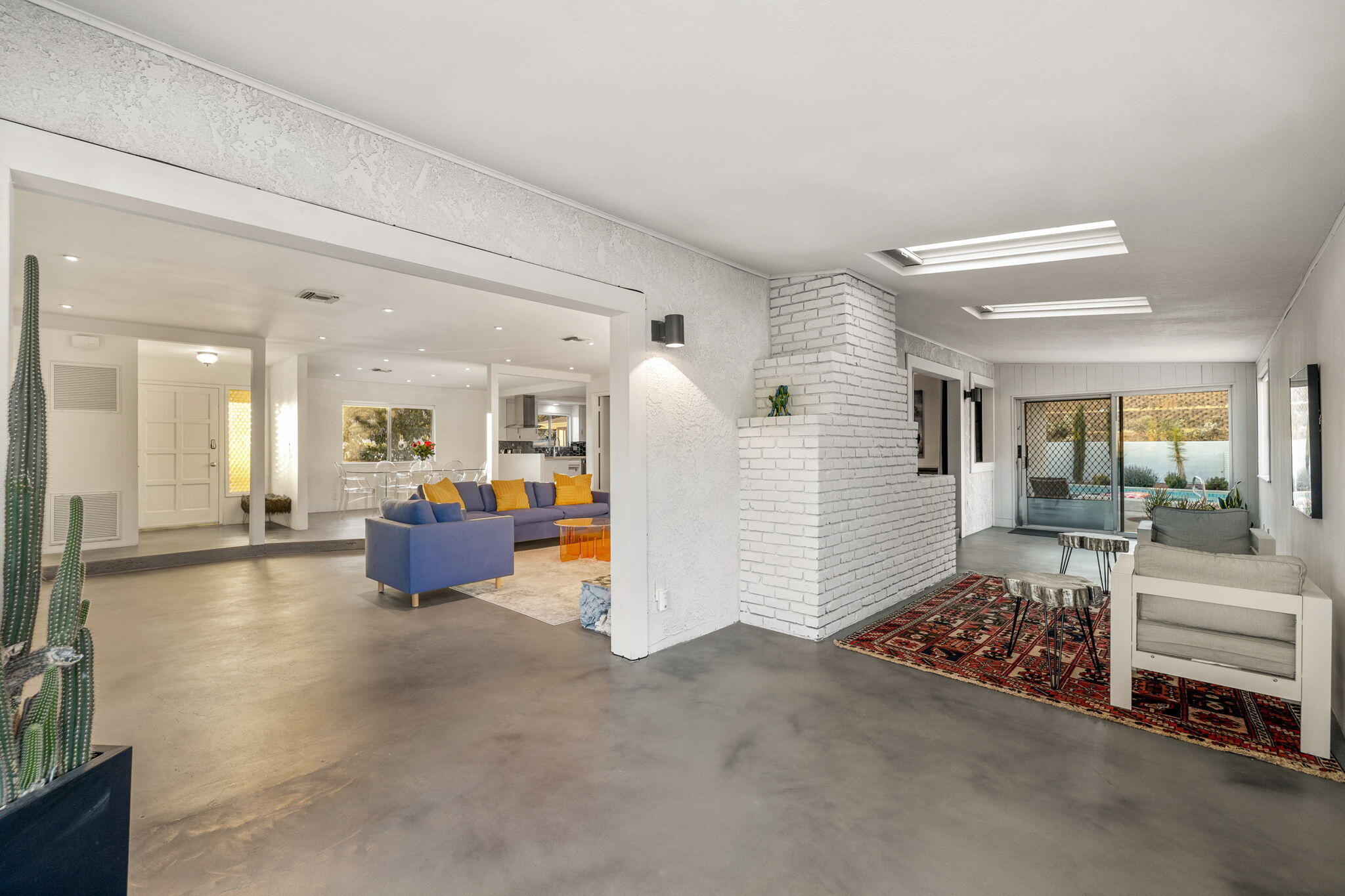 6451 Red Bluff Avenue Yucca Valley, CA 92284 - Photo 30 of 71 a living room with furniture and a table