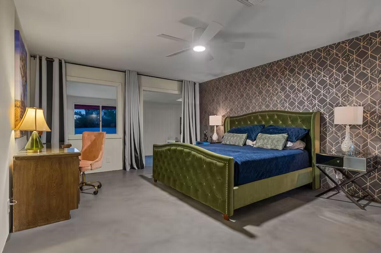 6451 Red Bluff Avenue Yucca Valley, CA 92284 - Photo 34 of 71 a bed sitting in a room next to a window