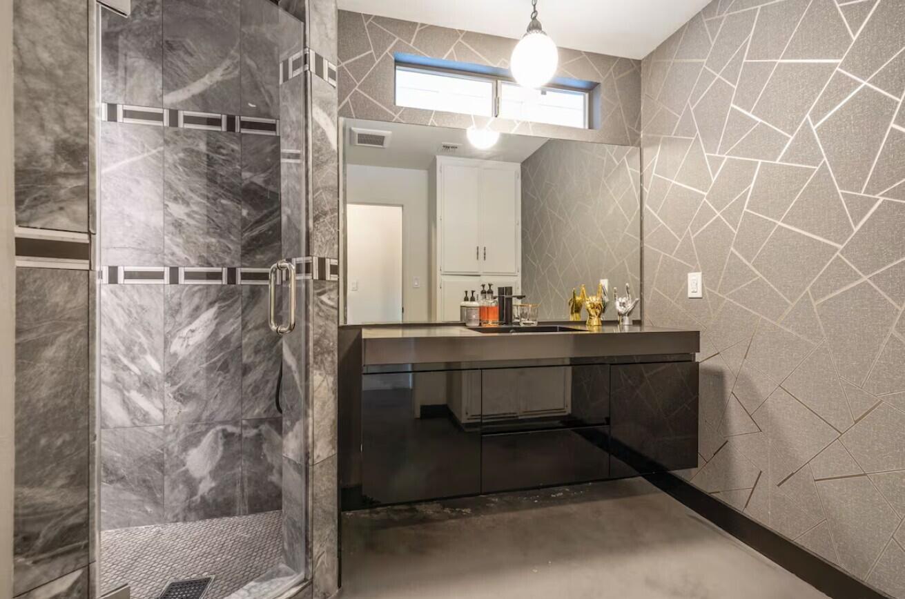 6451 Red Bluff Avenue Yucca Valley, CA 92284 - Photo 42 of 71 a bathroom with a sink and a mirror