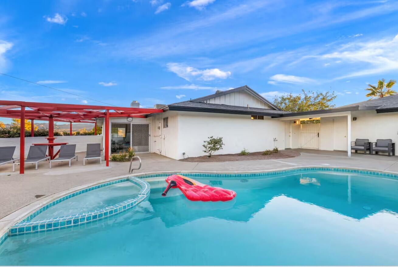 6451 Red Bluff Avenue Yucca Valley, CA 92284 - Photo 50 of 71 a view of a swimming pool with a patio