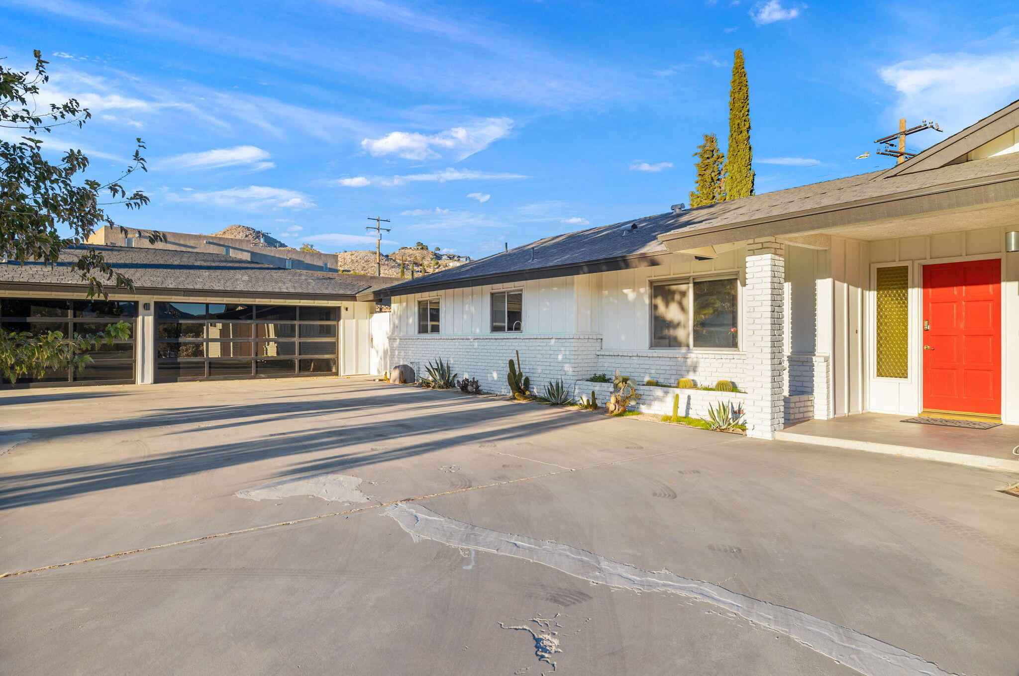 6451 Red Bluff Avenue Yucca Valley, CA 92284 - Photo 67 of 71 a front view of a house with a outdoor space