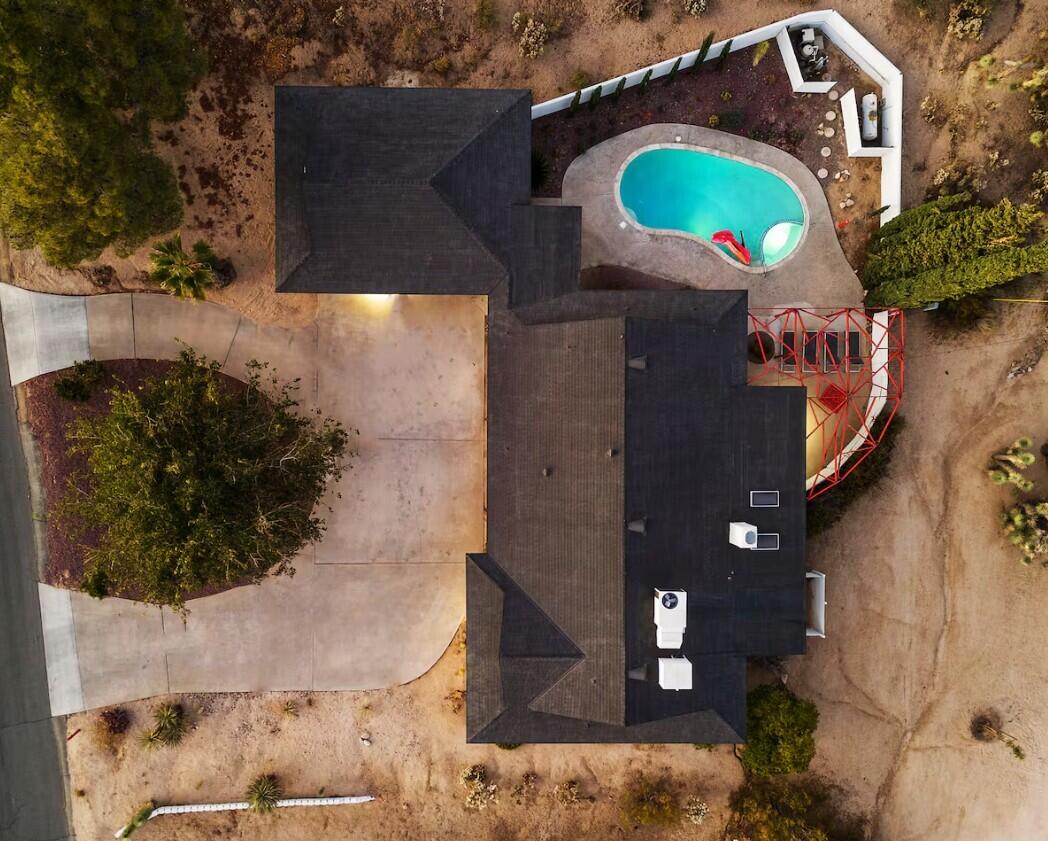 6451 Red Bluff Avenue Yucca Valley, CA 92284 - Photo 71 of 71 an aerial view of a house with a swimming pool
