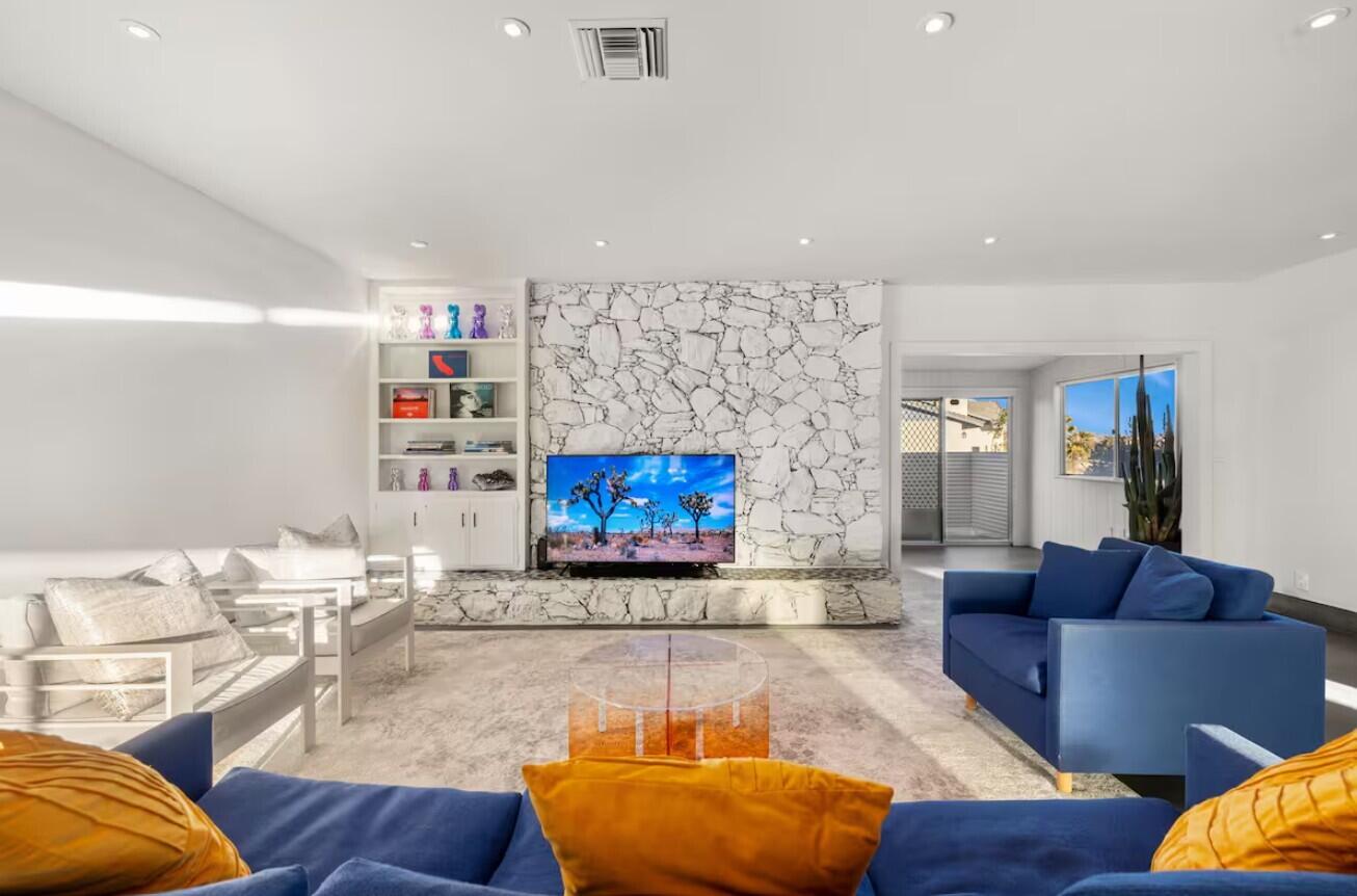 6451 Red Bluff Avenue Yucca Valley, CA 92284 - Photo 9 of 71 a living room with furniture and a couch