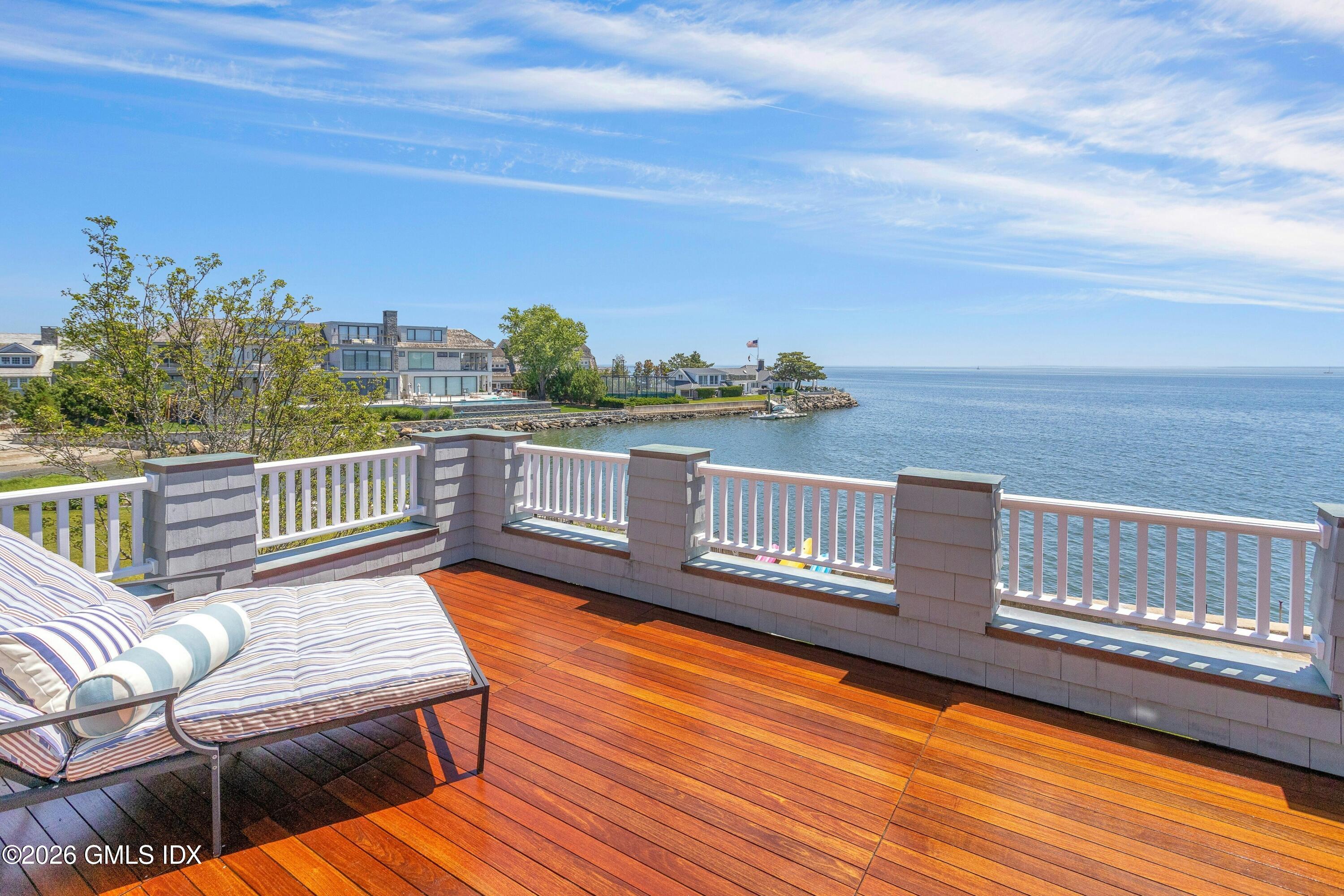 200 Shore Road Old Greenwich, CT 06870 - Photo 14 of 34 a view of a balcony with wooden floor
