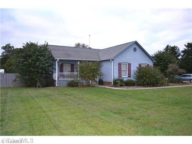7535 Strawberry Road Summerfield, NC 27358 - Photo 1 of 13 Exterior Front.